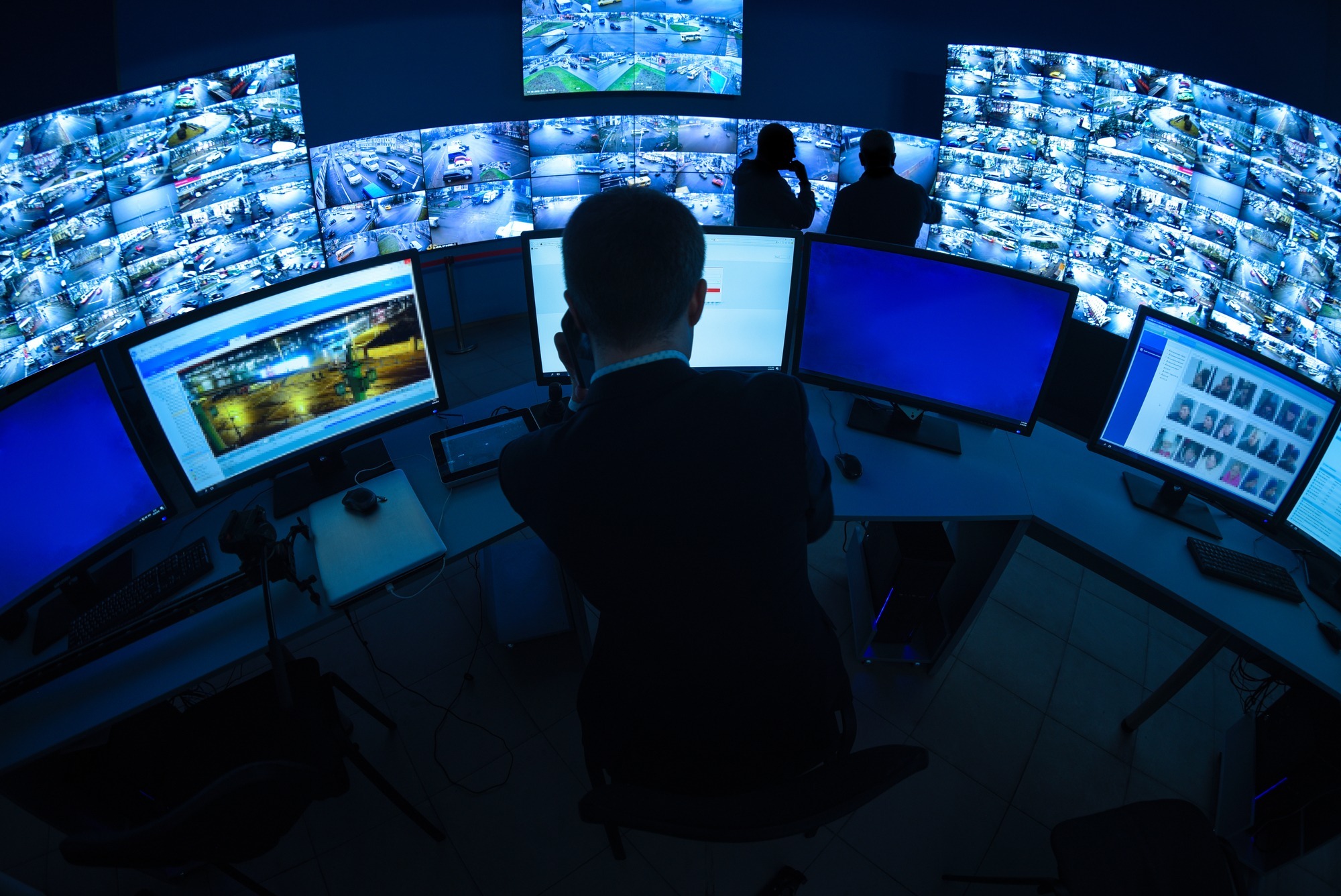 Security Officers Monitoring Street Footage