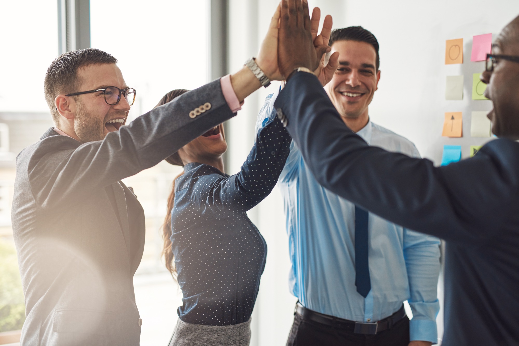 Multiracial Team Having A High Five